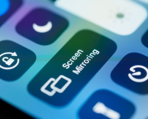 Close up of a smartphone screen showing brightness adjustment slider